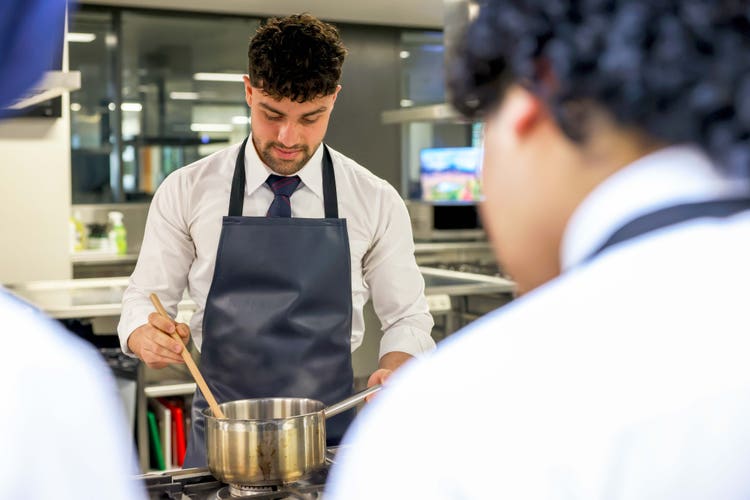 Year 12 student cooking in class