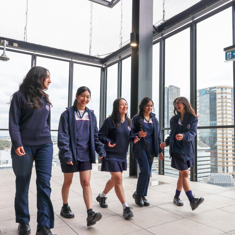 Five Year 10 Girls walking side-by-side